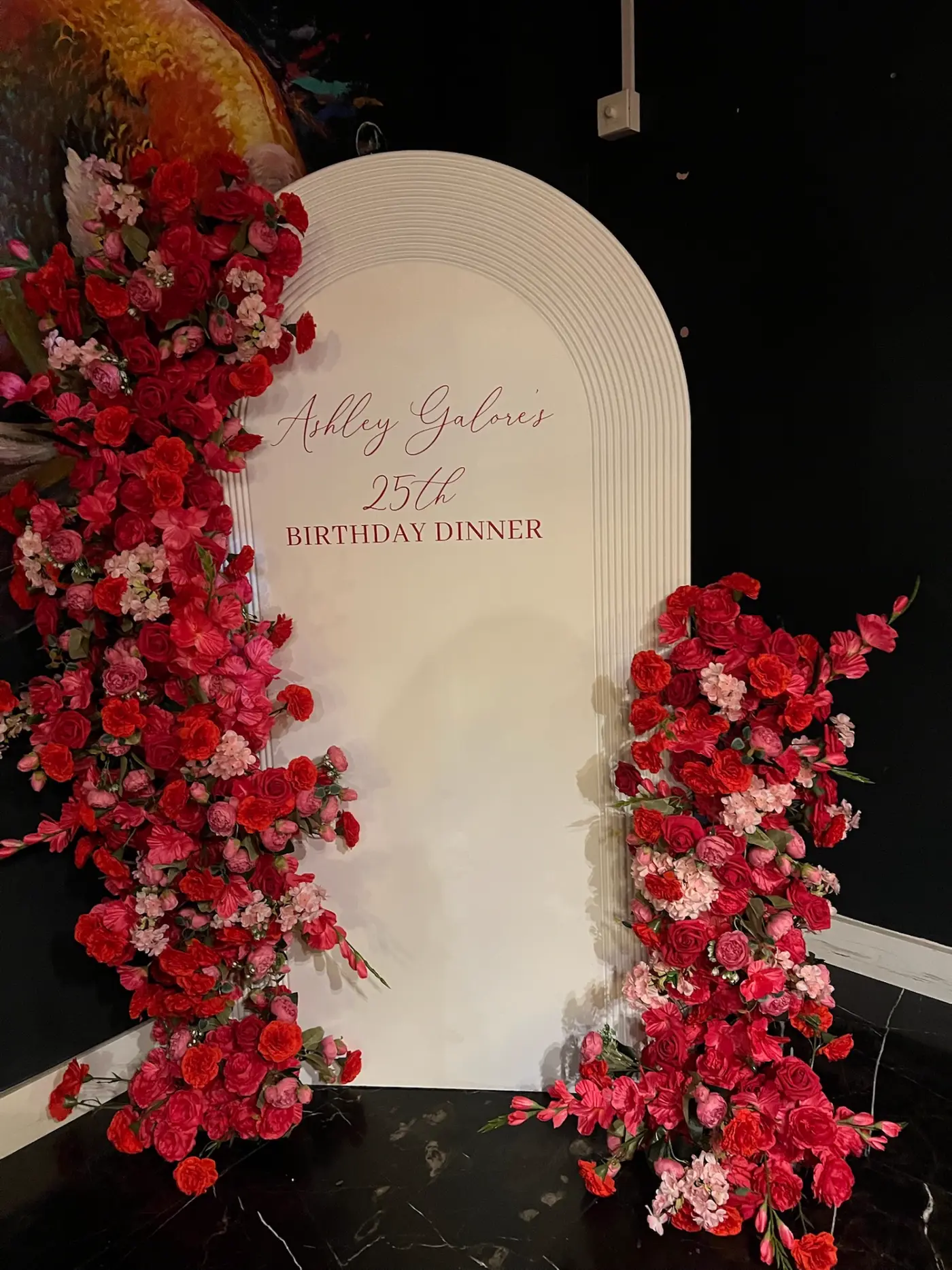 Blush and crimson tablescape with a floral runner