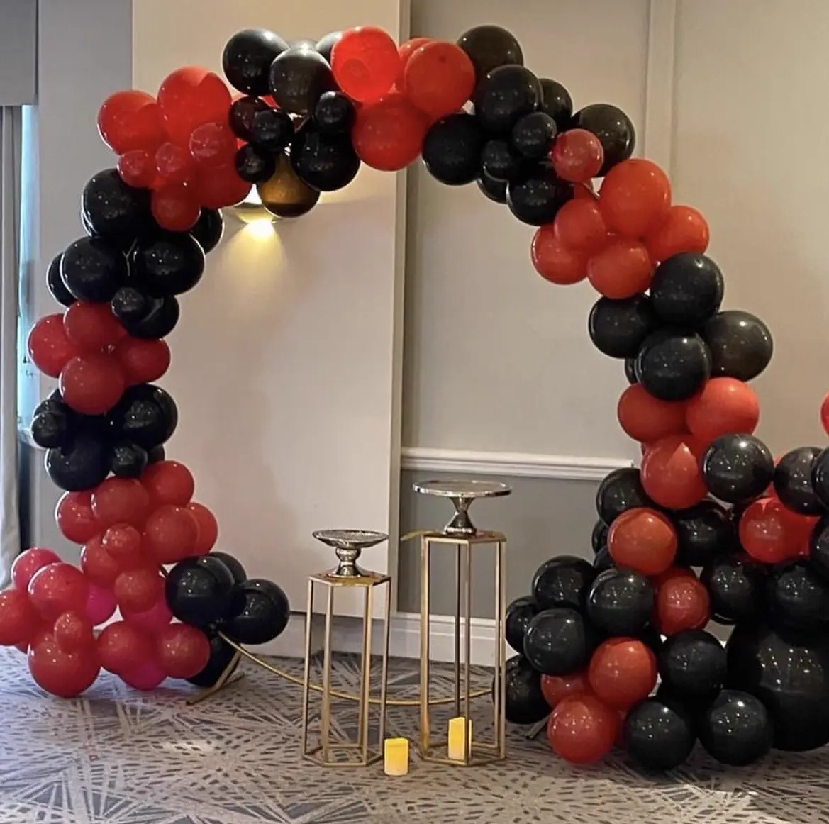 Red and black tablescape with rose centrepieces